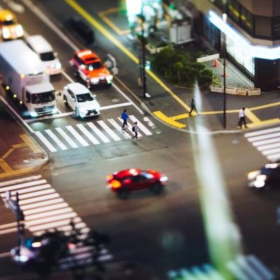 car crossing a traffic intersection